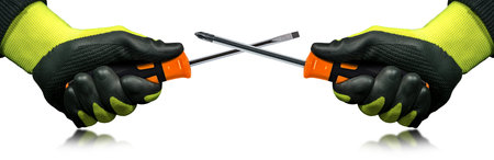 Manual workers with black and green protective work gloves holding a flat head screwdriver and a...