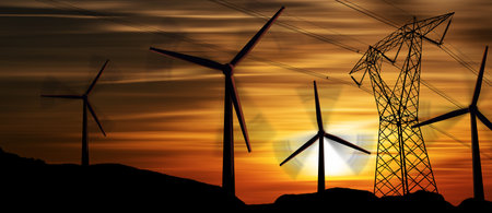 Silhouettes of a high voltage tower (power line with electric cables and insulators) and aa group of...