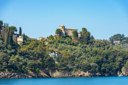 Medieval castle Brown or of Saint George (San Giorgio) in the famous village of Portofino, Mediterranean sea (Ligurian sea), Genoa province (Genova), Liguria, Italy, Europe.のeditorial素材
