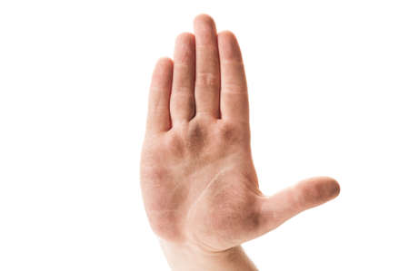 Stop begging for money concept using dirty homeless hand on white backgroundの写真素材