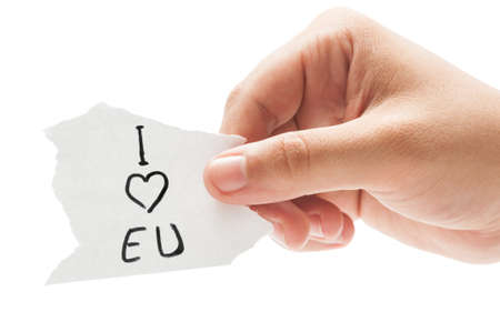 I love EU or European Union, concept  using a hand holding a small piece of paper on white backgroundの写真素材