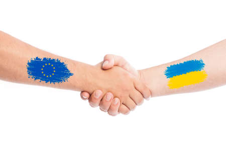 European Union and Ukraine shaking hands concept isolated on white backgroundの写真素材