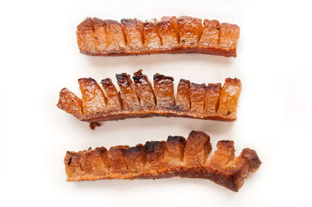 Closeup of tasty pig or pork panceta or bacon isolated on white backgroundの写真素材