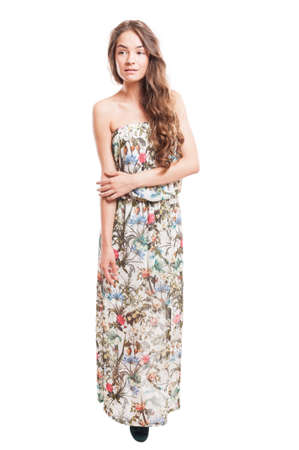 Beautiful female model with natural long hair on white backgroundの写真素材