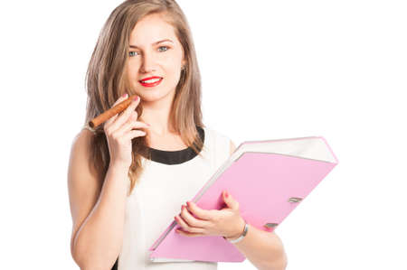 Young and successful business woman holding contracts and a cuban cigarの写真素材