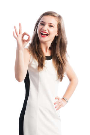 Business woman making ok or perfect gesture using hand while smilingの写真素材