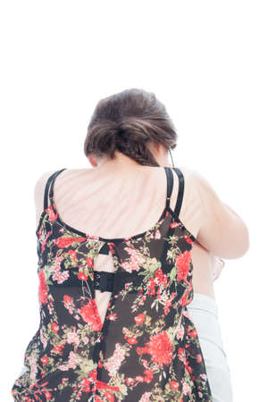 Wounds on a girls's back after beeing beaten by her fatherの写真素材