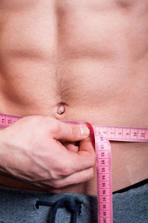 Closeup with a waist and metter. Slim fit conceptの写真素材