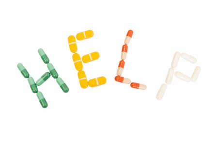 Help text from pills isolated on white backgroundの写真素材