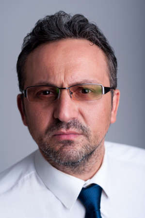 Portrait of smart and intelligent teacher wearing eyeglasses or spectaclesの写真素材