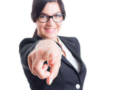 Business woman choosing or blaming me by poiting and aiming finger at the cameraの写真素材