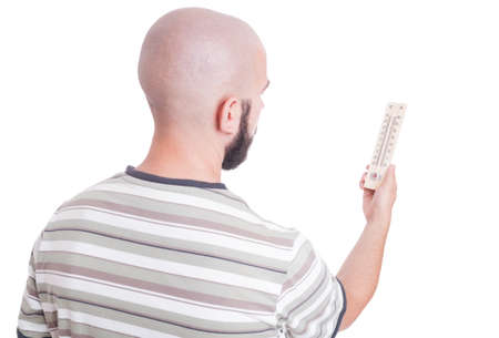 Man looking at thermometer isolated on whiteの写真素材