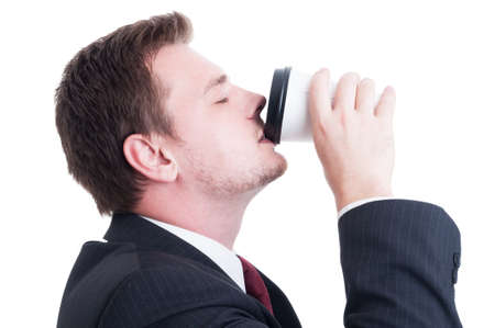Accountant or broker drinking coffee from a paper cup isolated on white