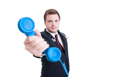 Hospital assistance or support person giving phone as contact us conceptの写真素材