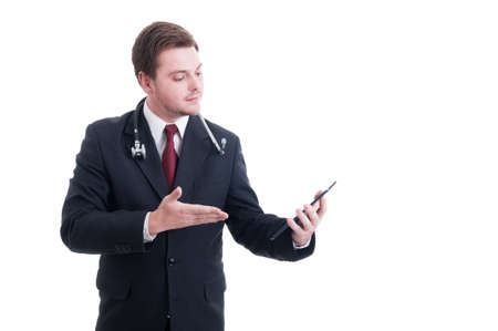 Modern doctor or medic  using wireless tablet isolated on white studio backgroundの写真素材