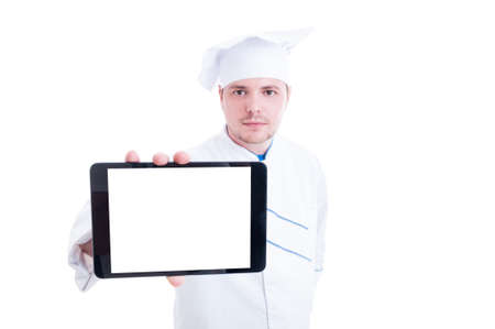 Chef or cook showing tablet with blank white empty screen displas as advertising copy space