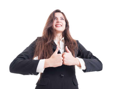 Hero shot of business woman showing double like gesture or thumbs-up isolated on white backgroundの写真素材