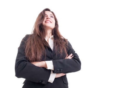 Hero shot of smiling business woman standing with arms crossed isolated on white backgroundの写真素材