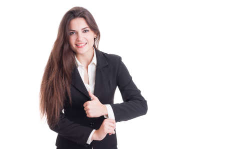 Long hair business woman adjusting suit sleeve and smiling successful isolated on white backgroundの写真素材