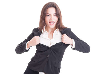 Young successful business woman acting sexy by opening her suit jacket as super woman isolated on white backgroundの写真素材