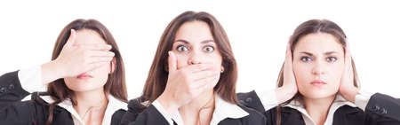 Business woman in three stances blind, mute and deaf in wide image isolated on white backgroundの写真素材