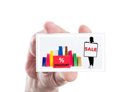 Hand holding sale and discount card isolatd on white backgroundの写真素材