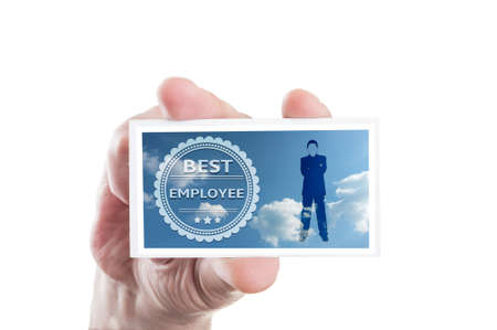 Hand holding best employee card concept isolated on white backgroundの写真素材
