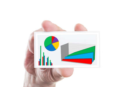 Hand holding business paper card with financial charts and graphsの写真素材
