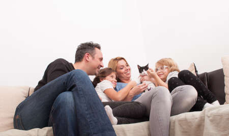 Happy family time in the living room on the couch or sofa