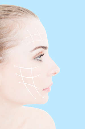 Beautiful female with clean fresh skin and arrows collage on her face as cosmetic treatment concept...