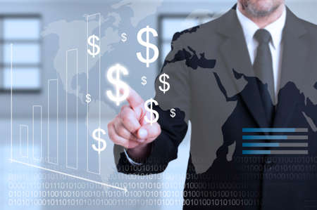 Businessman touching transparent digital screen as curency transactions concept based on dollar symbolの写真素材