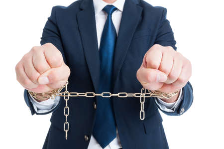 Breaking the law concept with corrupt chained politician or lawyer in closeup being arrested...