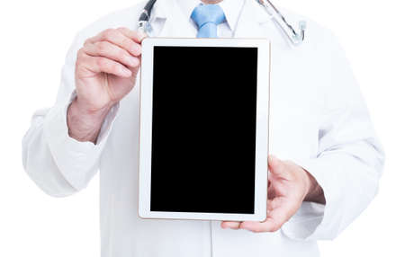 Close-up of male medic or doctor holding tablet with black screen isolated on white background with advertising areaの写真素材