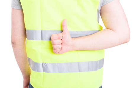Back view of constructor in closeup showing thumb up or doing like gesture isolated on white studio backgroundの写真素材