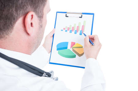 Back of medic analyzing charts or statistics isolated on white backgroundの写真素材