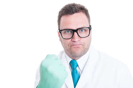 Male scientist close-up showing fist like being mad isolated on white background with advertising spaceの写真素材
