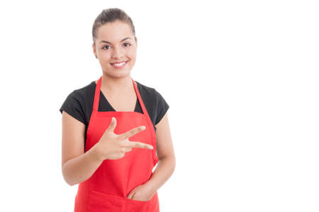 Supermarket employee smiling and showing number three isolated on white background with copy spaceの写真素材