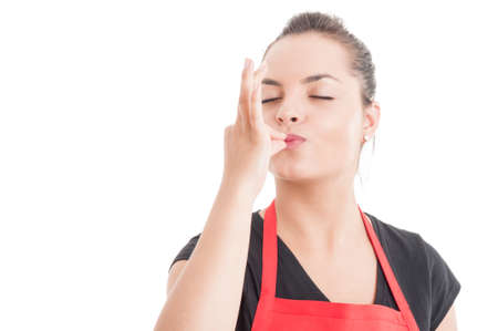 Excellent choice concept with supermarket employee with work apron isolated on white background with copyspaceの写真素材