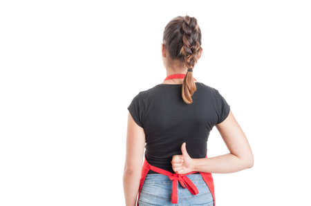 Rear view of hypermarket employee doing thumbup or like gesture isolated on white with copyspaceの写真素材