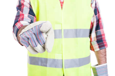 Closeup of builder hand with glove pointing at you isolated on white studio backgroundの写真素材