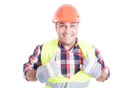 Joyful male constructor acting like superhero and tearing his vest off isolated on white studio...