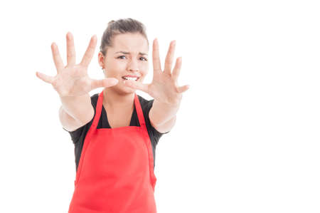 Young market seller looking stressed and asking for help on white background with text areaの写真素材
