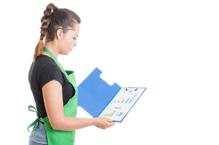 Young employee read the data on clipboard as financial analysis concept isolated on white with...