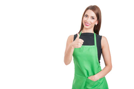 Trustworthy saleswoman doing like gesture as professional services concept isolated on white background with copy spaceの写真素材