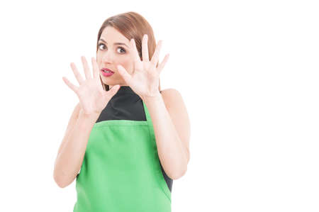 Terrified young employee doing a rejection gesture as danger concept isolated on white background with text spaceの写真素材
