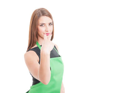 Look into my eyes gesture with young female employee isolated on white with advertising areaの写真素材