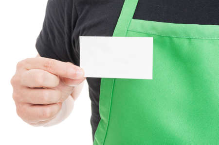 Close-up of supermarket employee showing business card isolated on white background with copy text spaceの写真素材