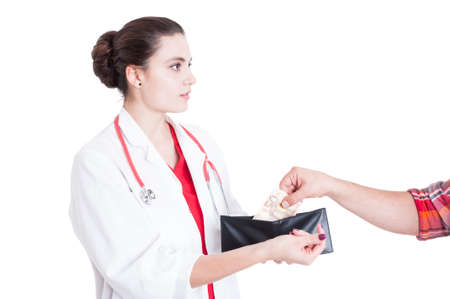 Picture of woman medic asking for illegal money to male patient isolated on white backgroundの写真素材