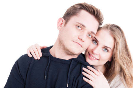 Happy couple posing and being affective with each other isolated on white background