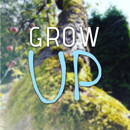 Grow up text as motivation quote on wallpaper with filter effectの写真素材